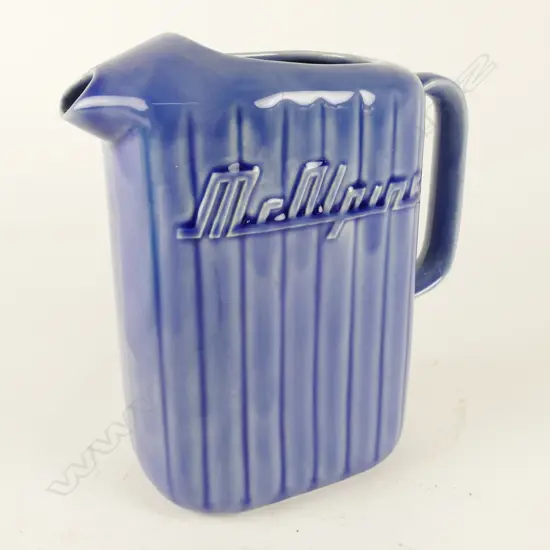 An uncommon Crown Lynn dark blue McAlpine refrigerator jug