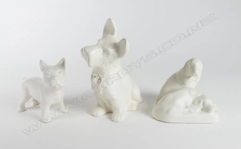 Three Crown Lynn white glaze dog models Image 1++