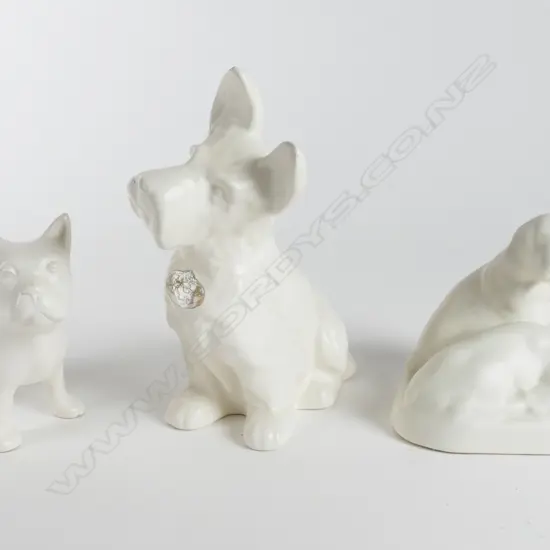 Three Crown Lynn white glaze dog models