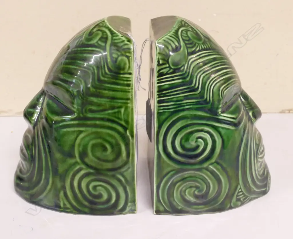 A pair of Crown Lynn Wharetana Maori Art 'Moko' book-ends Image 1++