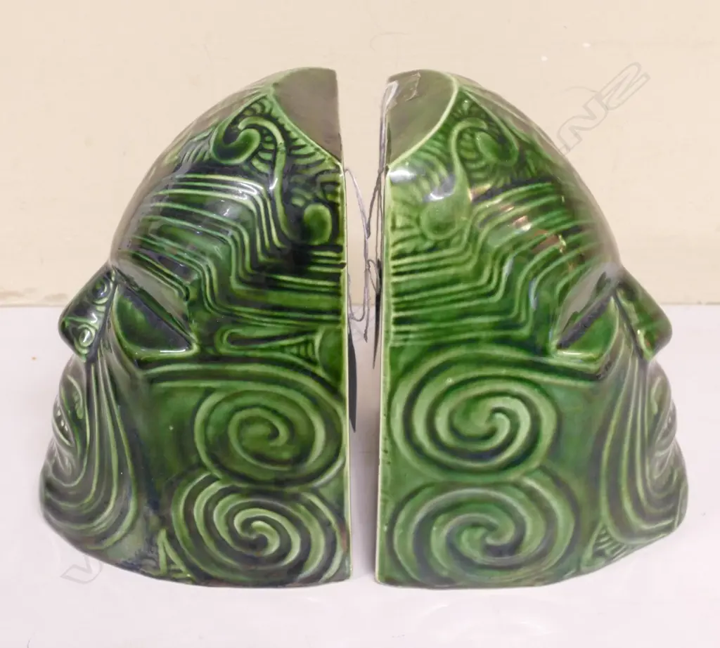 A pair of Crown Lynn Wharetana Maori Art 'Moko' book-ends Image 1++