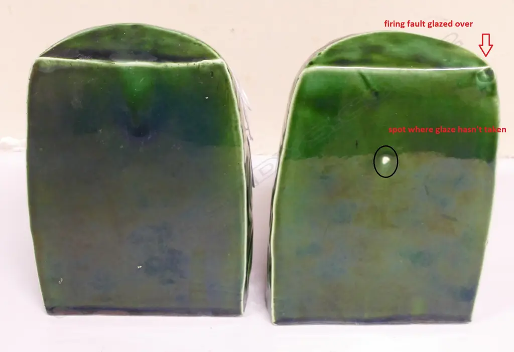 A pair of Crown Lynn Wharetana Maori Art 'Moko' book-ends Image 1++