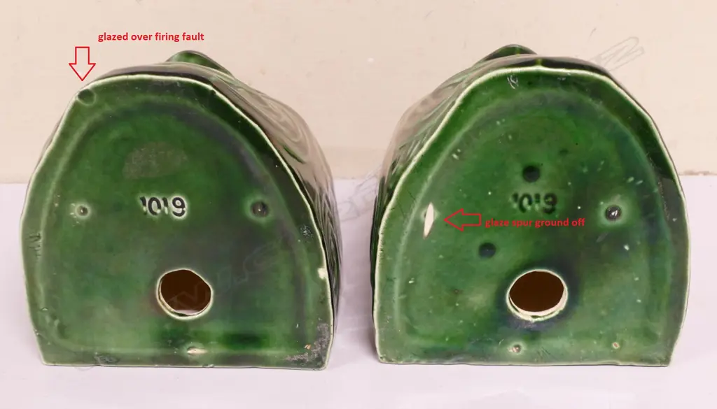 A pair of Crown Lynn Wharetana Maori Art 'Moko' book-ends Image 1++