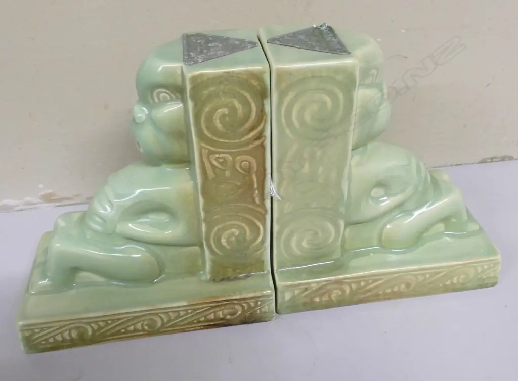 A pair of Crown Lynn Wharetana Maori Art Pottery 'Tiki' book-ends Image 1++