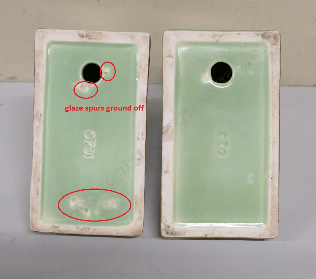 A pair of Crown Lynn Wharetana Maori Art Pottery 'Tiki' book-ends Image 1++