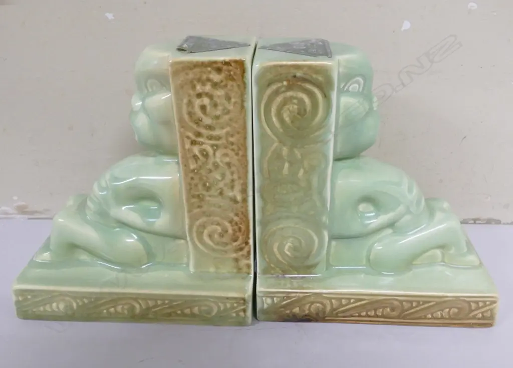 A pair of Crown Lynn Wharetana Maori Art Pottery 'Tiki' book-ends Image 1++
