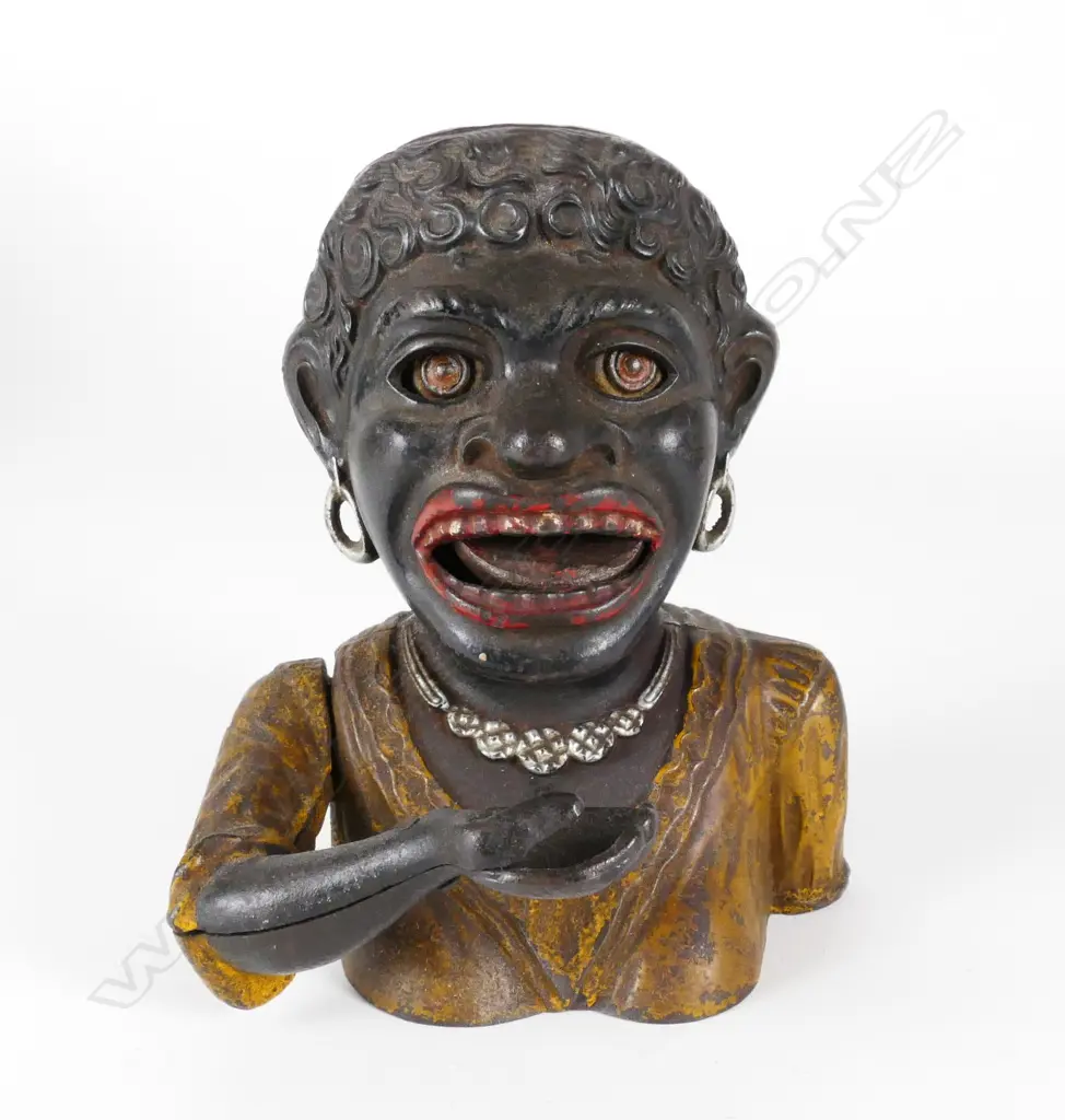 An old Dinah cast-iron mechanical bank Image 1++