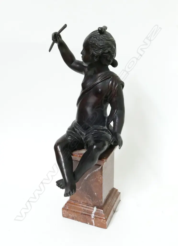 A bronze statuette Image 1++