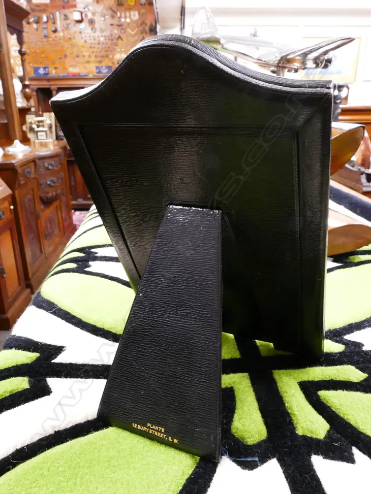 A vintage leather photo frame holding a signed photograph of King George VI and Queen Elizabeth II Image 1++