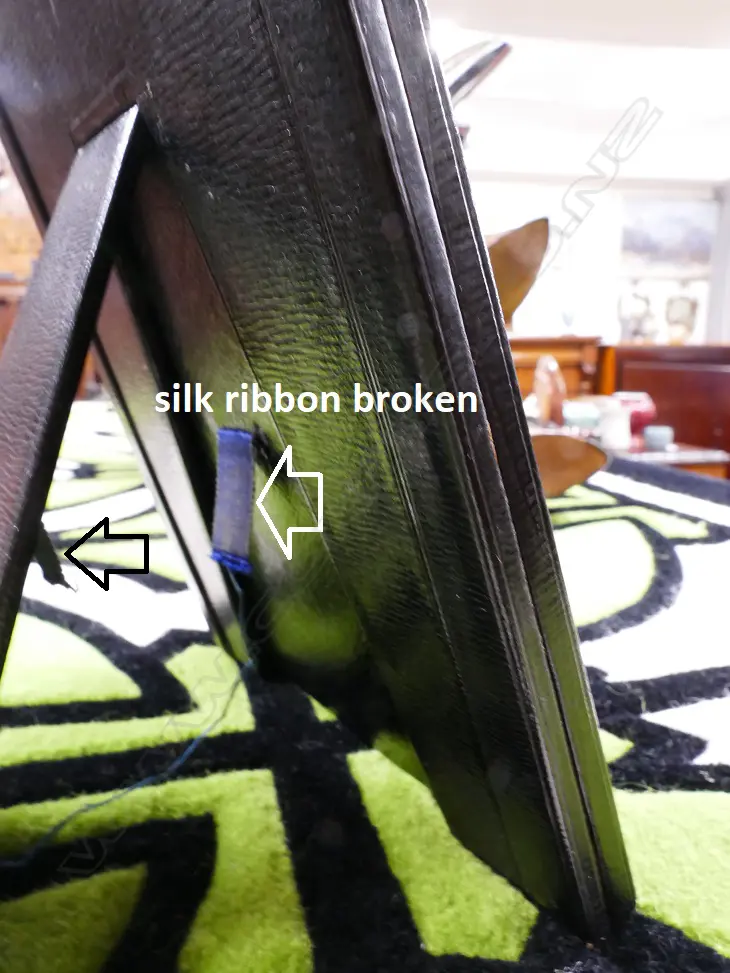 A vintage leather photo frame holding a signed photograph of King George VI and Queen Elizabeth II Image 1++