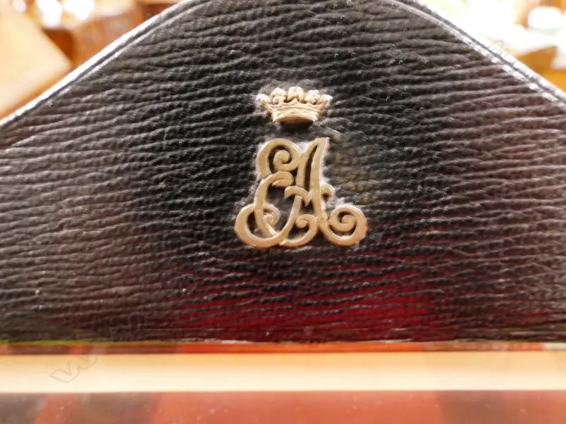 A vintage leather photo frame holding a signed photograph of King George VI and Queen Elizabeth II Image 1++