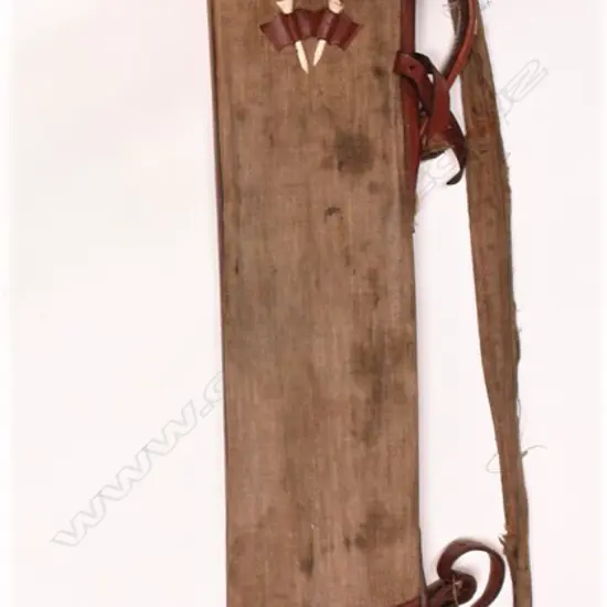 An old canvas and leather stitched trim golf bag with a collection of six hickory shafted clubs