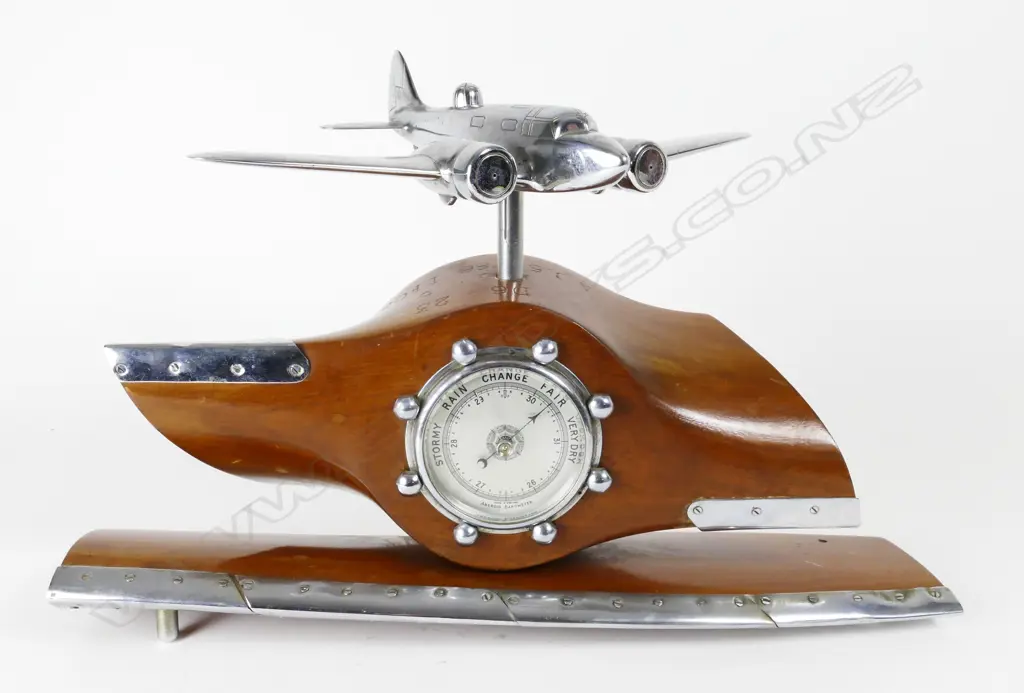 A chromed brass model of an Airspeed Oxford training bomber with dorsal turret Image 1++