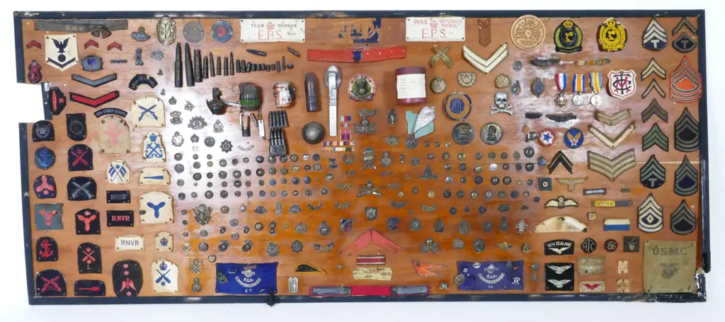 An impressive vintage military collection on display board Image 1++