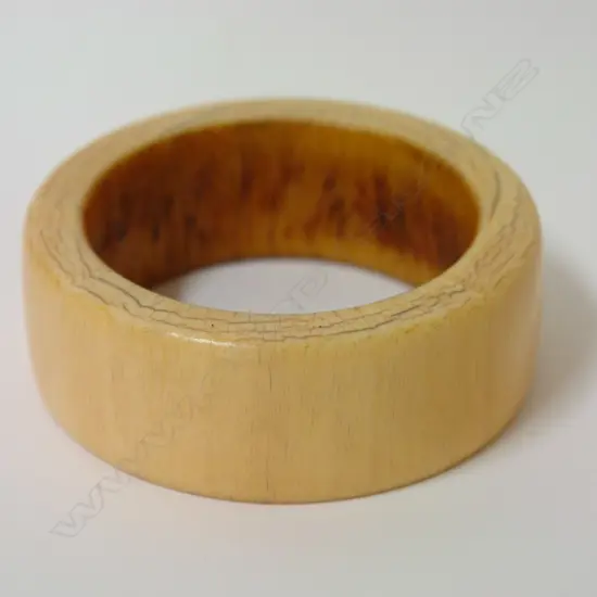 A large old African ivory tusk section bangle