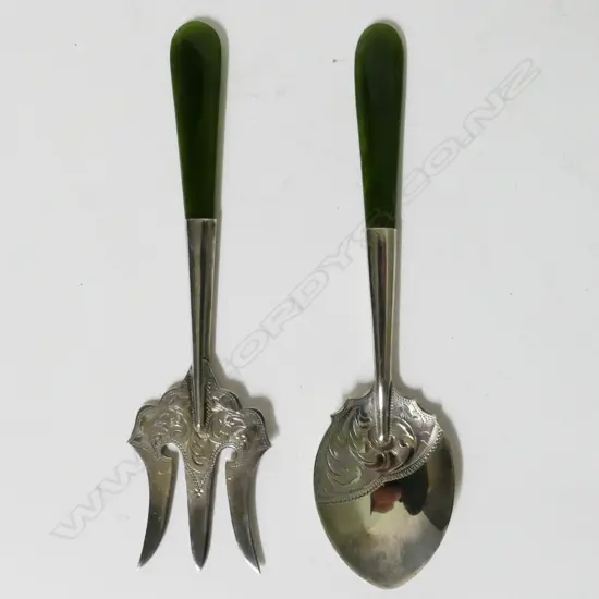A silver cake fork and jam spoon