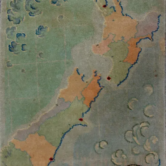 A vintage Feltex N.Z. map rug