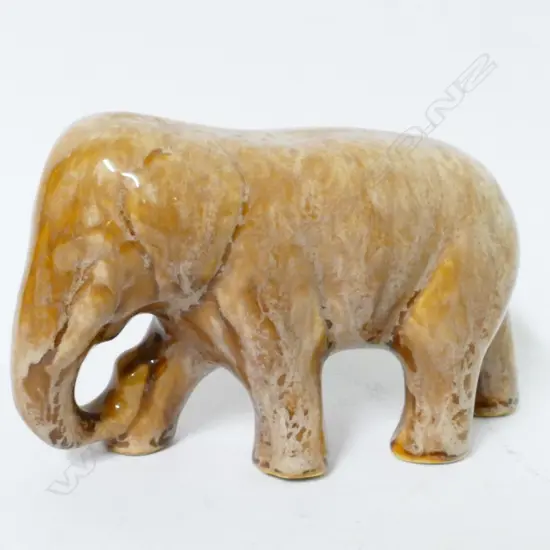 A Crown Lynn (Ambrico) light brown trickle glaze standing elephant