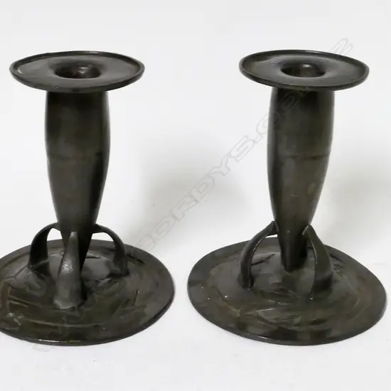 A pair of pewter Art Nouveau vases of bullet shape