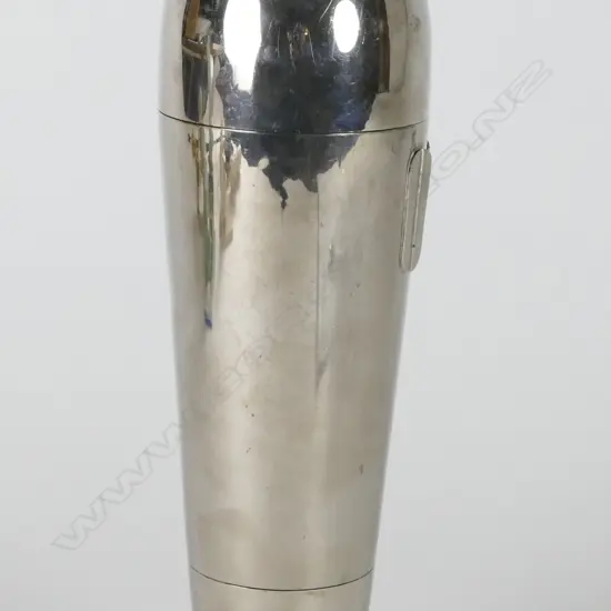 A vintage silver plate Zeppelin cocktail shaker