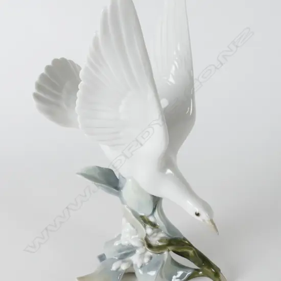 A Lladro porcelain figure of a dove