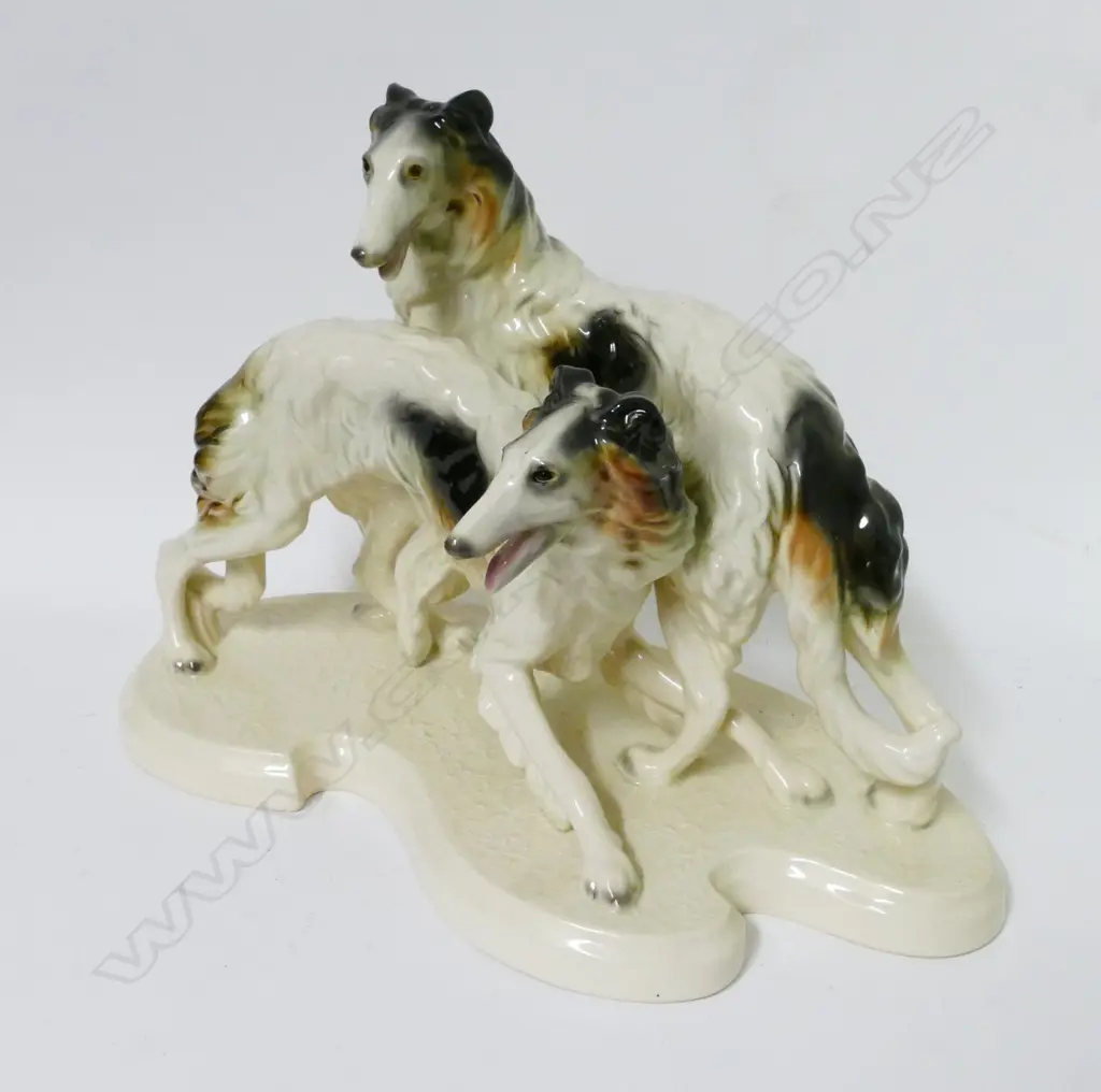 A German porcelain sculpture of two borzoi hounds Image 1++