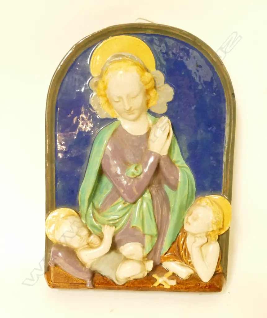 An earthenware plaque in the manner of Della Robbia Image 1++