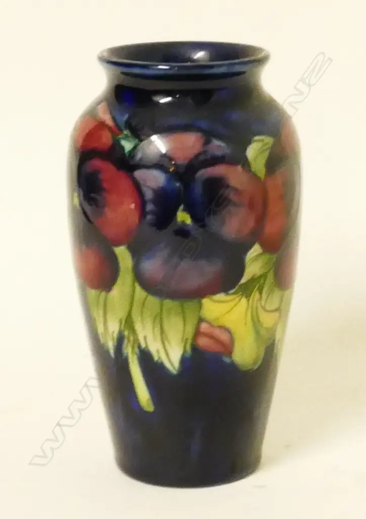 A small William Moorcroft 'Pansy' pattern vase Image 1++