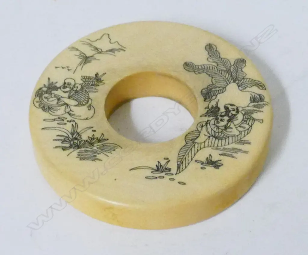 A Chinese ivory bi-disc Image 1++