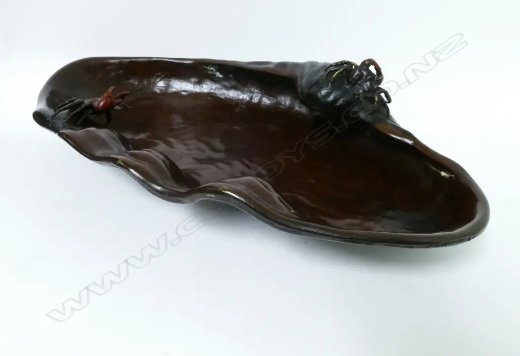 An old bronze shell shaped dish Image 1++