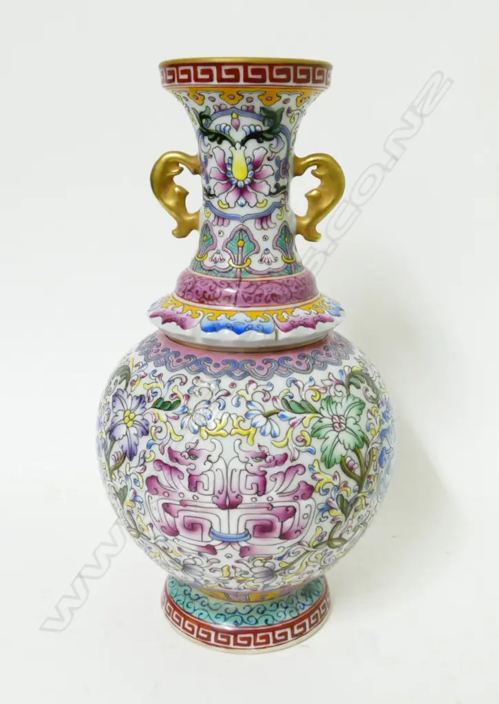 A Chinese porcelain Canton enamel decorated vase Image 1++
