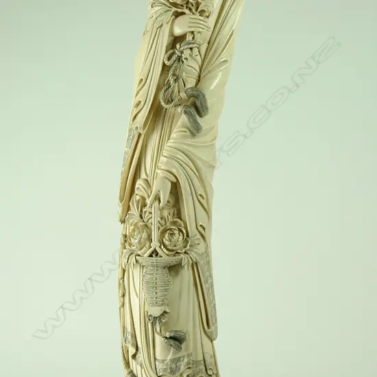 An exceptional large old carved ivory tusk