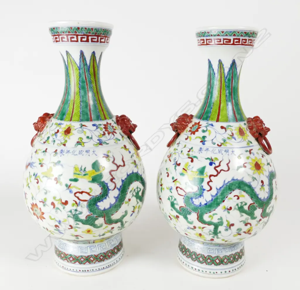 A pair of Chinese polychrome porcelain baluster vases Image 1++