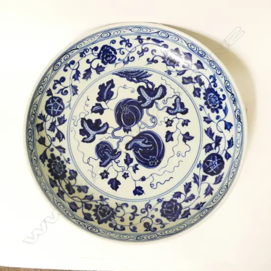 A Chinese blue and white porcelain shallow circular dish