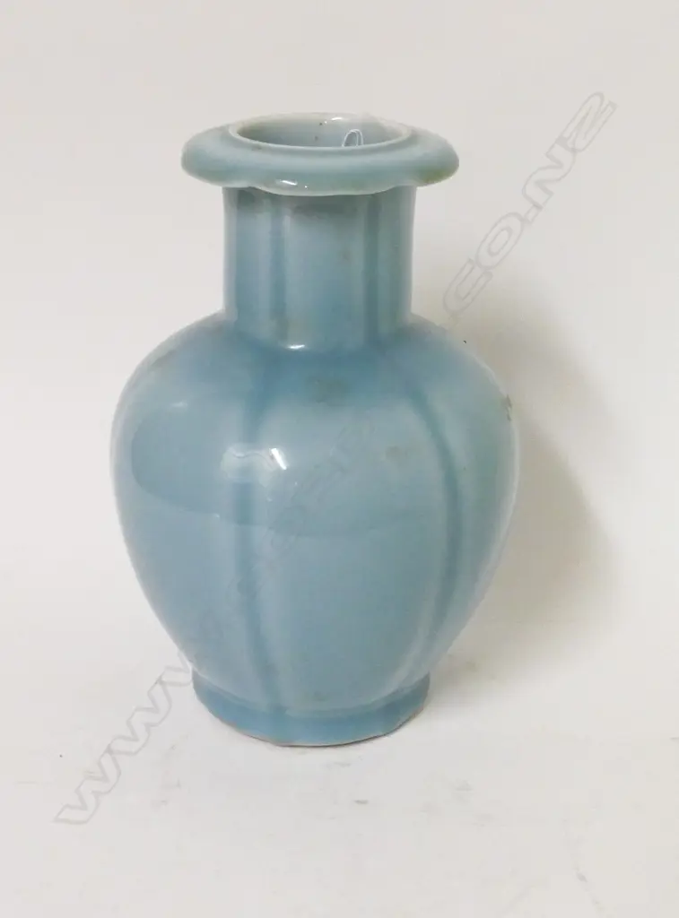 A Chinese porcelain vase glazed in pale blue monochrome Image 1++