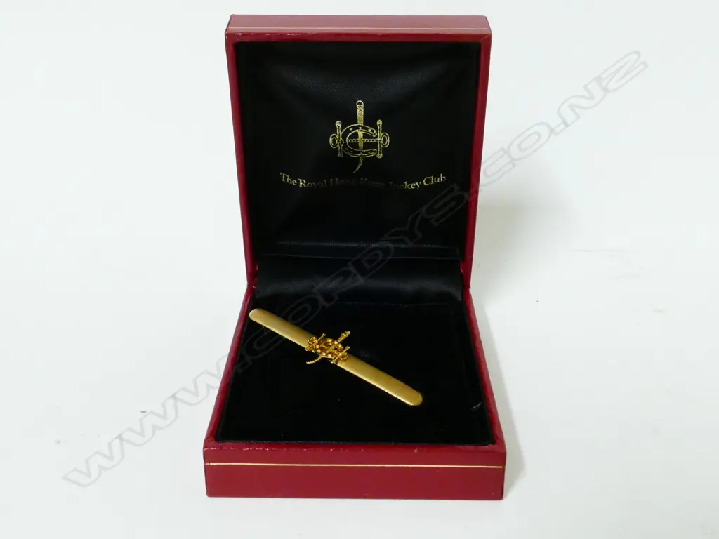 An 18ct. gold Royal Hong Kong Jockey club tie slide Image 1++