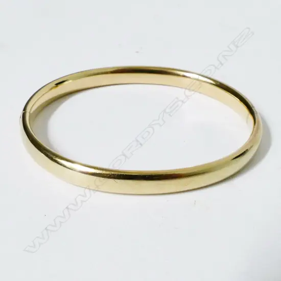 A 14ct. gold snap bracelet