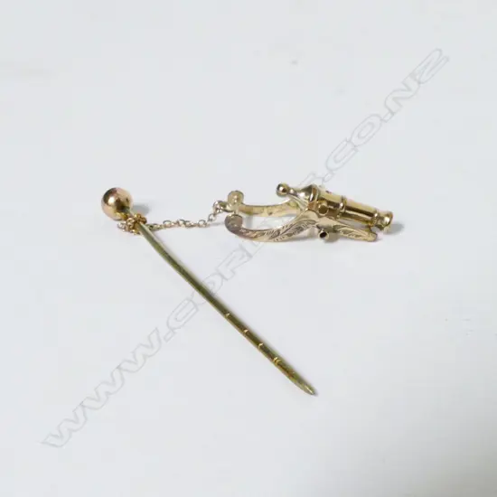 A 9ct. gold stick pin