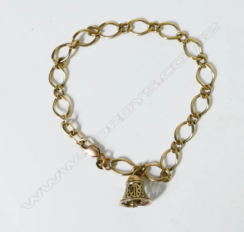 A 9ct. gold charm bracelet Image 1++