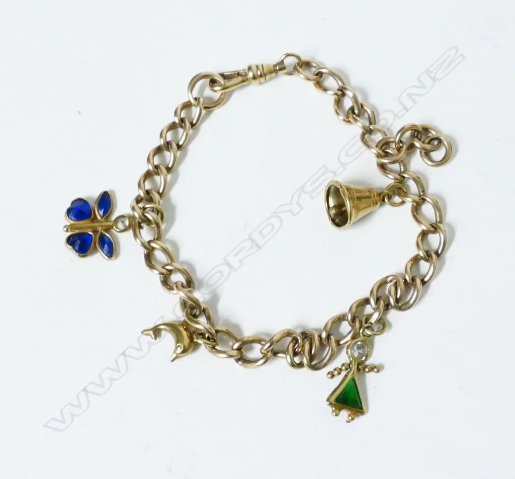 A 9ct. gold charm bracelet Image 1++