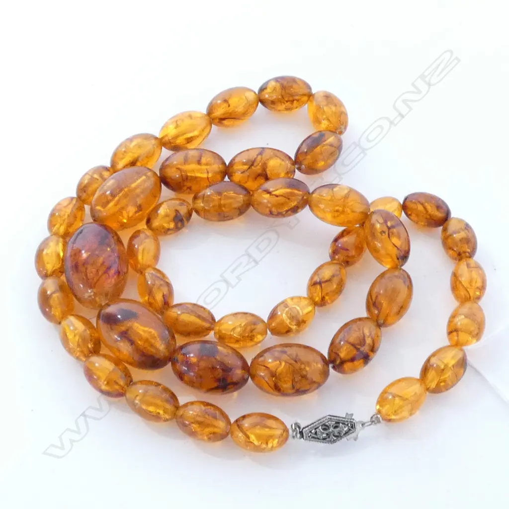 A vintage amber type molded graduated bead necklace Image 1++