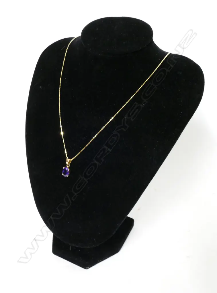 An 18ct. gold amethyst pendant Image 1++