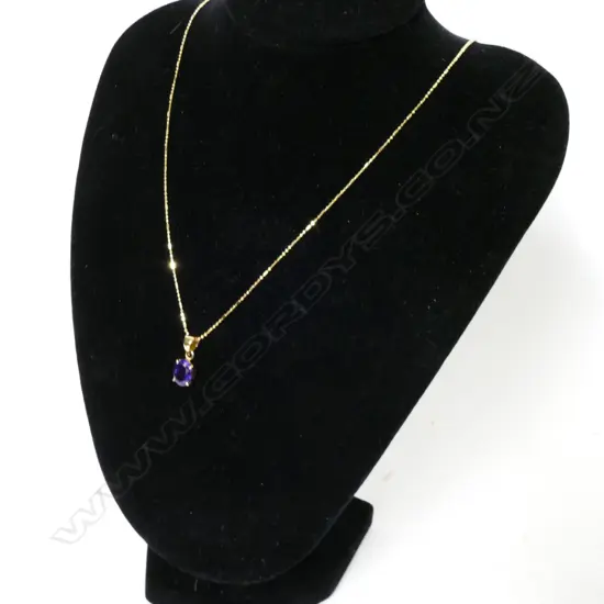 An 18ct. gold amethyst pendant
