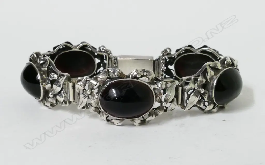 An early 20thC Arts & Crafts style silver and garnet? bracelet Image 1++