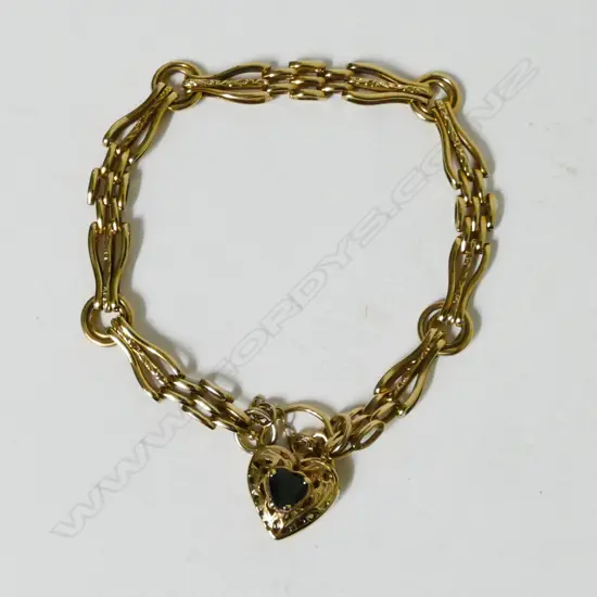 A 9ct. gold gate bracelet
