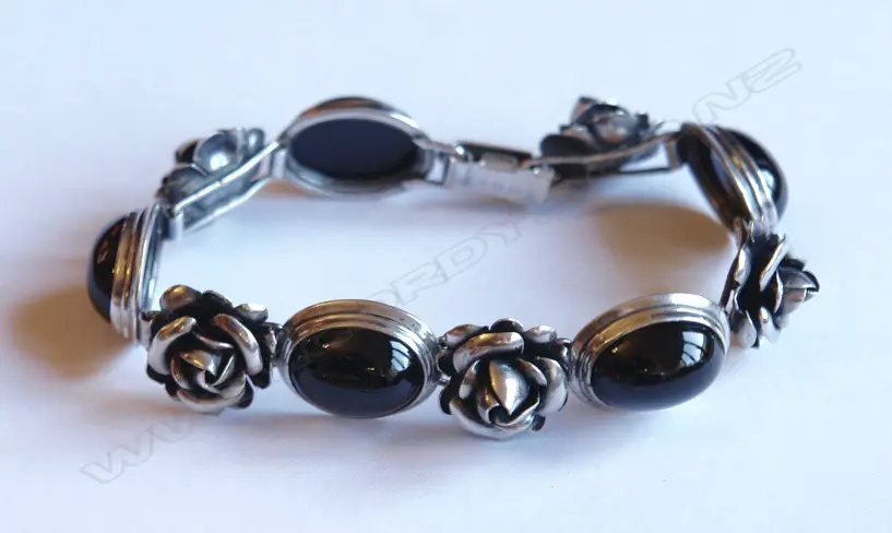 A silver and onyx bracelet Image 1++