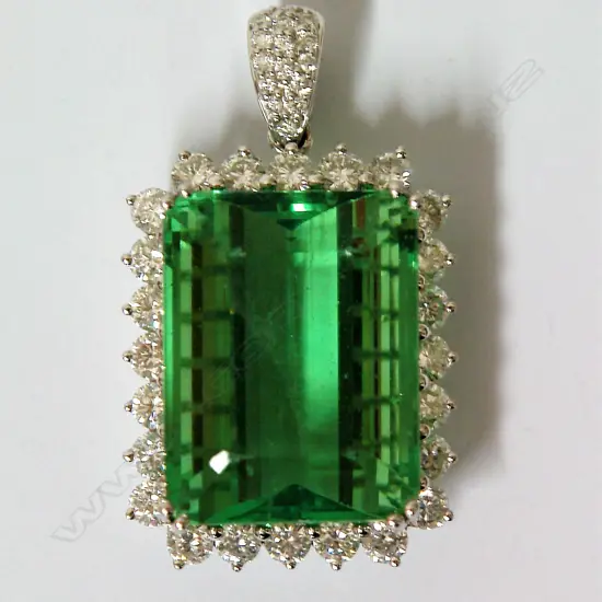 An impressive lady's 18ct. white gold green fluorite and diamond pendant