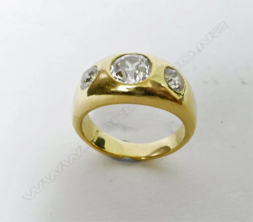 An 18ct. gold and diamond ring Image 1++