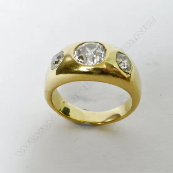 An 18ct. gold and diamond ring