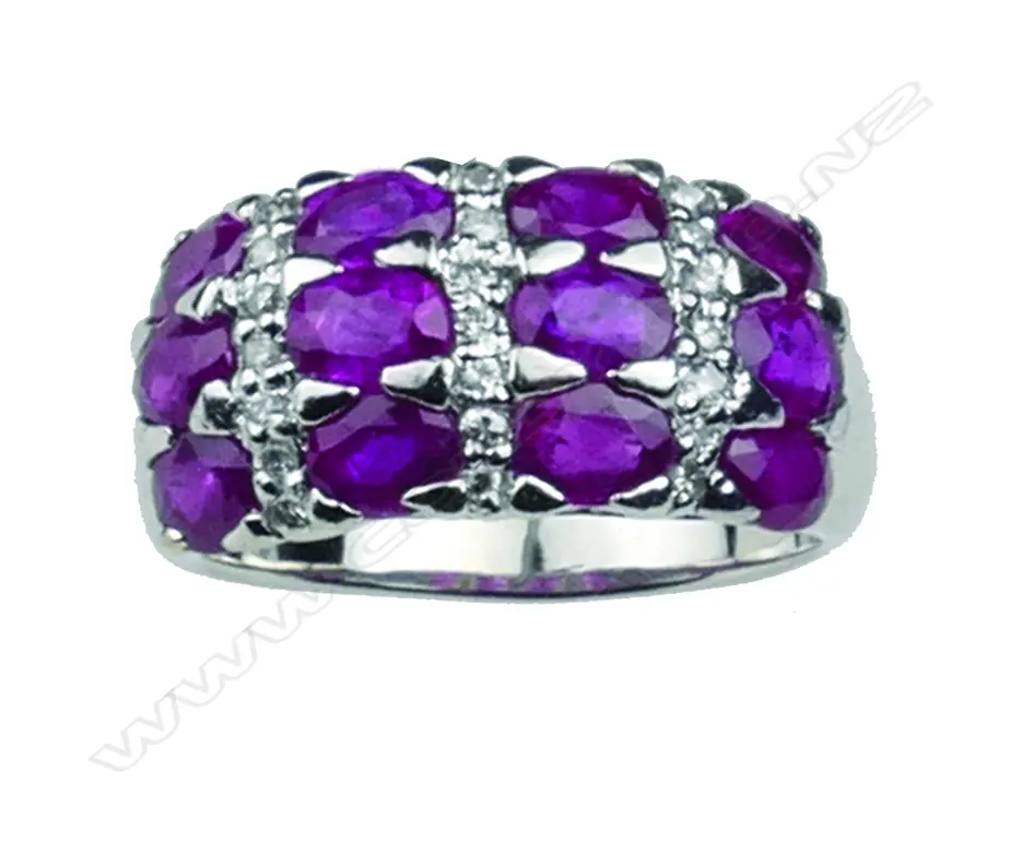 A modern lady's platinum ruby and diamond cluster ring Image 1++